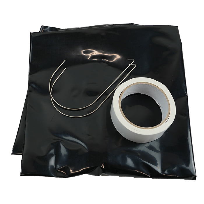 Adhesive tape edge on zipper dust barrier door